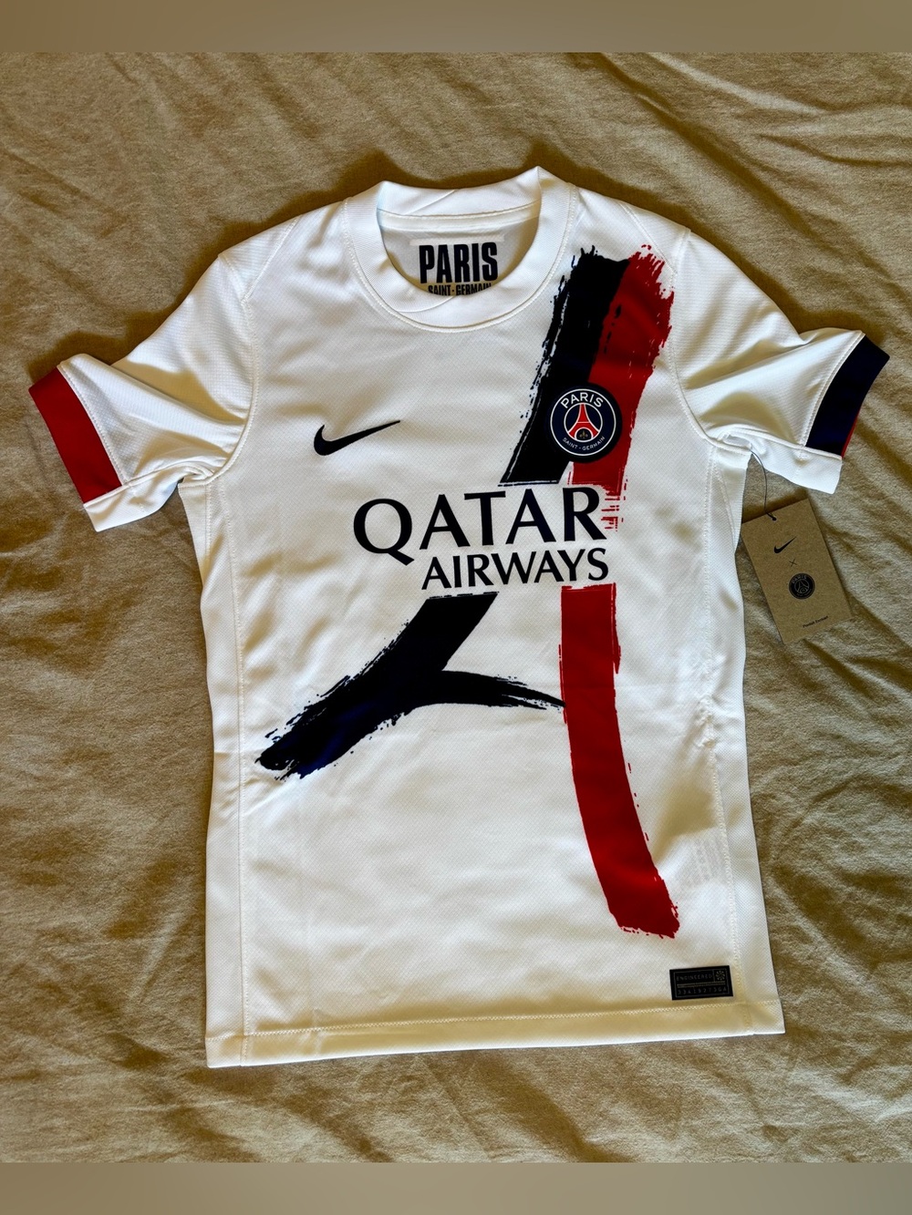 Nike Paris Saint-Germain Kids White Jersey with Red & Black Brush Accents